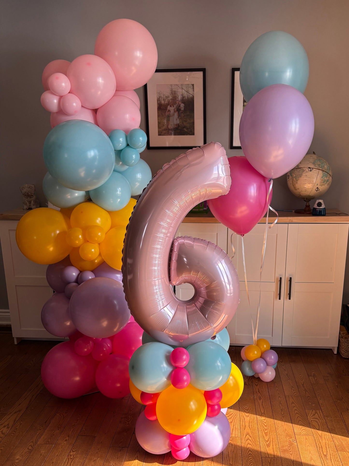 Balloon Garland in pink light blue golden rod blossom purple and fuchsia pink, Helium Balloons and Short Stack Party Package all matching